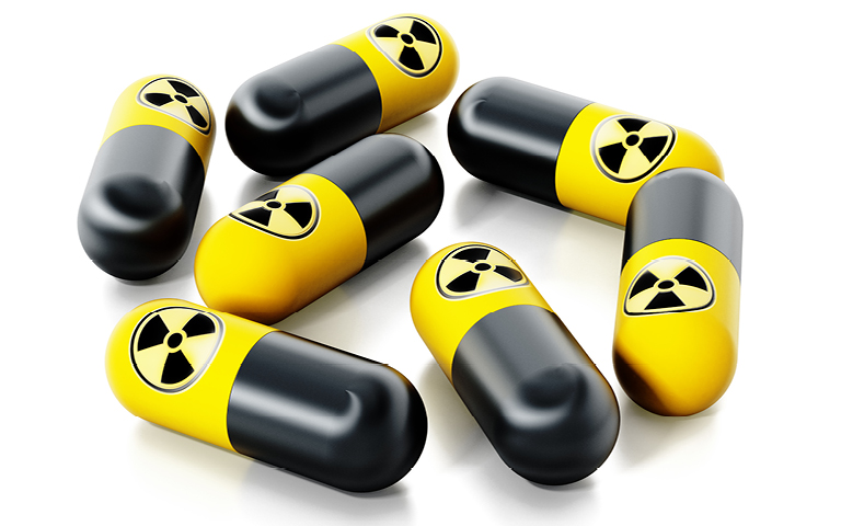 illustration of pills with nuclear logo