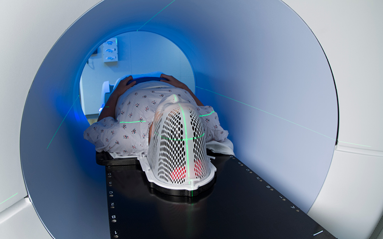 photo: person having head and neck MRI