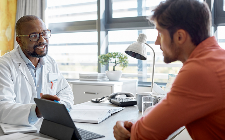 Doctor talks with patient