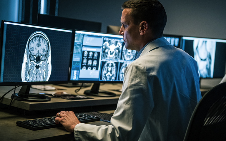 Radiologist reviews images