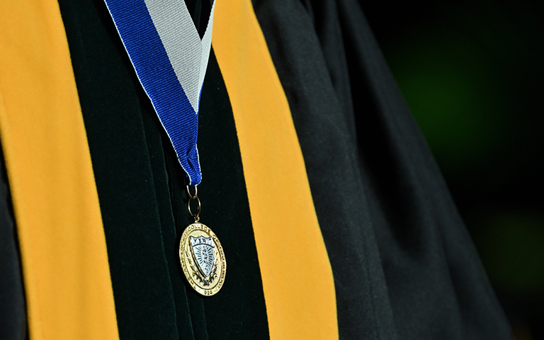Close up of ACR gold medal