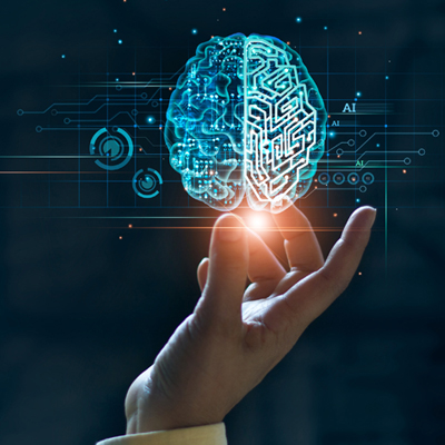 Hand holding abstract radiology image of a brain