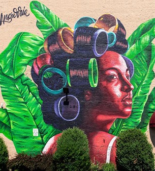 This mural, called Doña Patria by Evaristo Angurria, is located in Lynn, Massachusetts. A large print of the mural now hangs in one of MGH’s community health centers thanks to The People’s heART project.