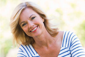 Smiling white woman in her forties