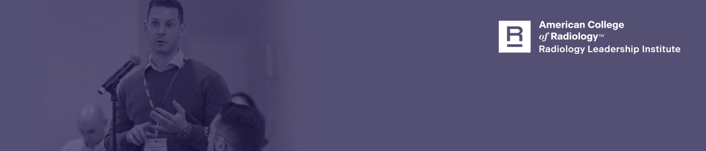 Image of a man speaking at a conference