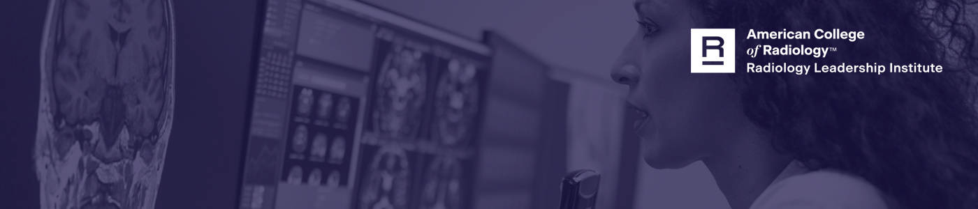 Photo of female radiologist reviewing scans